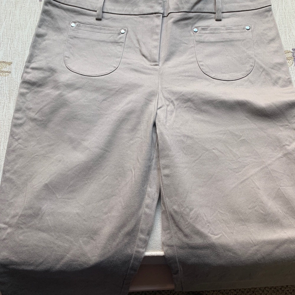Tan cropped pants.